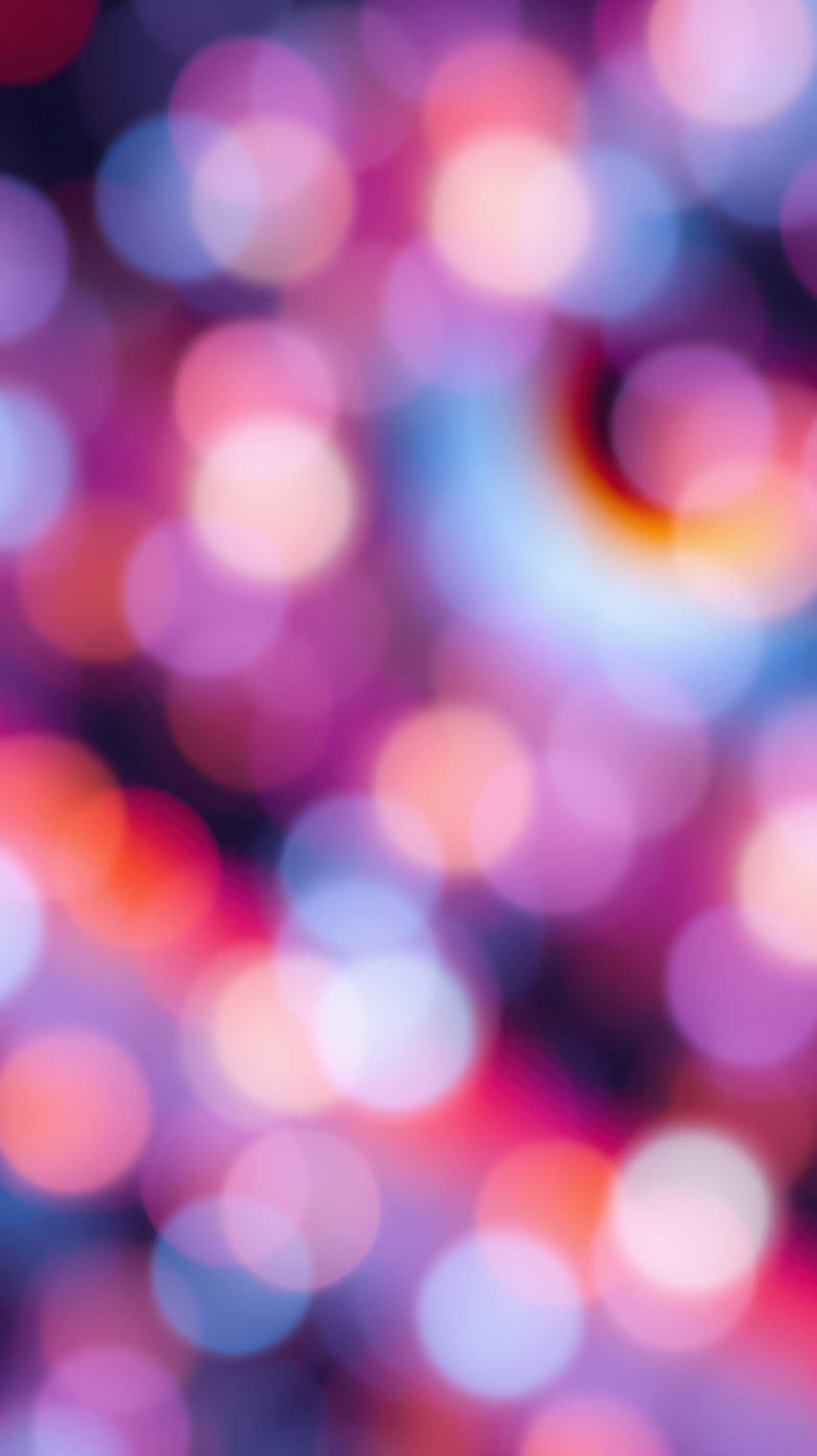 Abstract colorful bokeh lights creating a dreamy atmosphere during a festive celebration at night